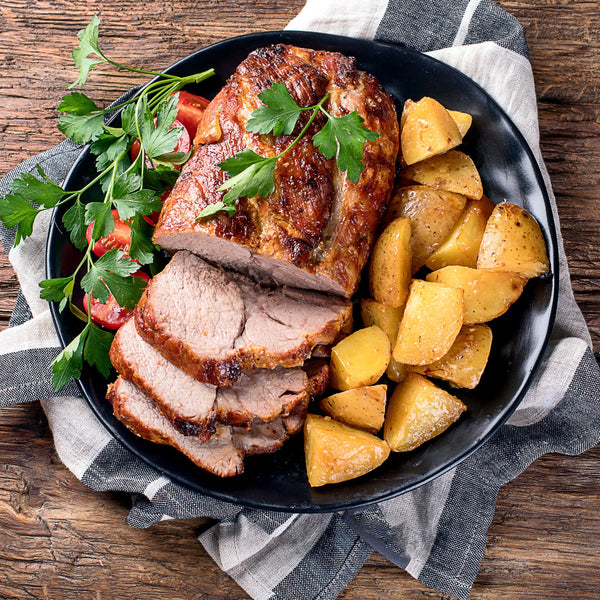 Italian style Free range Tamworth pork shoulder rib eye roast with crackling stuffed with fresh garlic, rosemary, thyme, sage, fennel and lemon (Frozen)